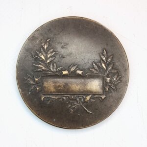 MEDAILLE FEMME ETUDIANT DANS UN BUREAU EBM90107